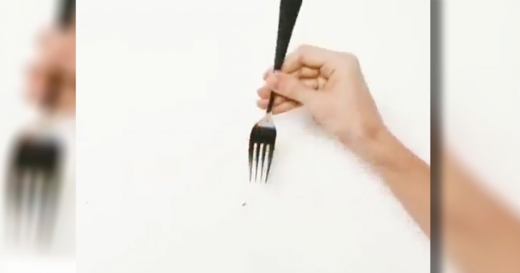 use a fork to hang a picture