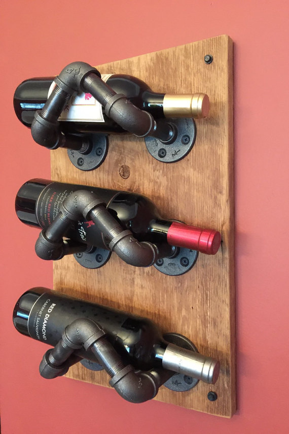 DIY Industrial Pipe Projects _ wine rack _ all created 
